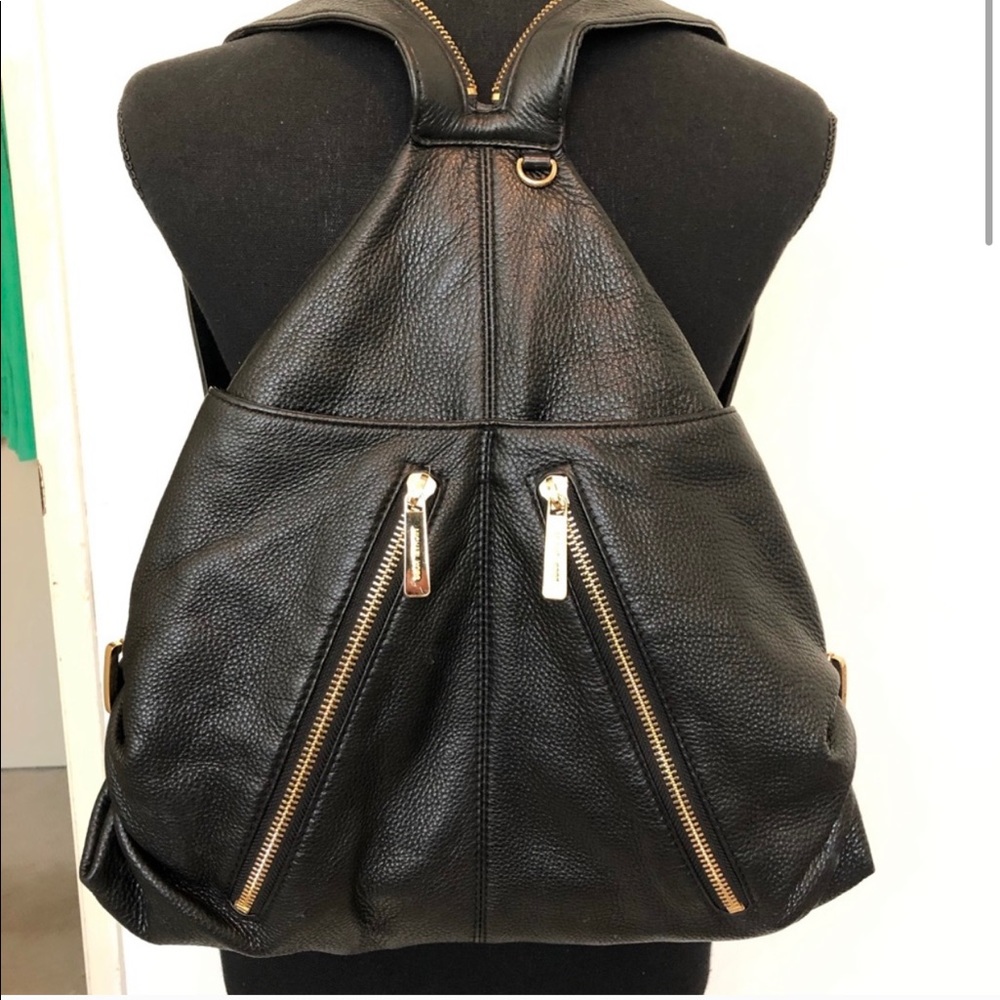 MIchael Kors backpack. Black with gold accents.